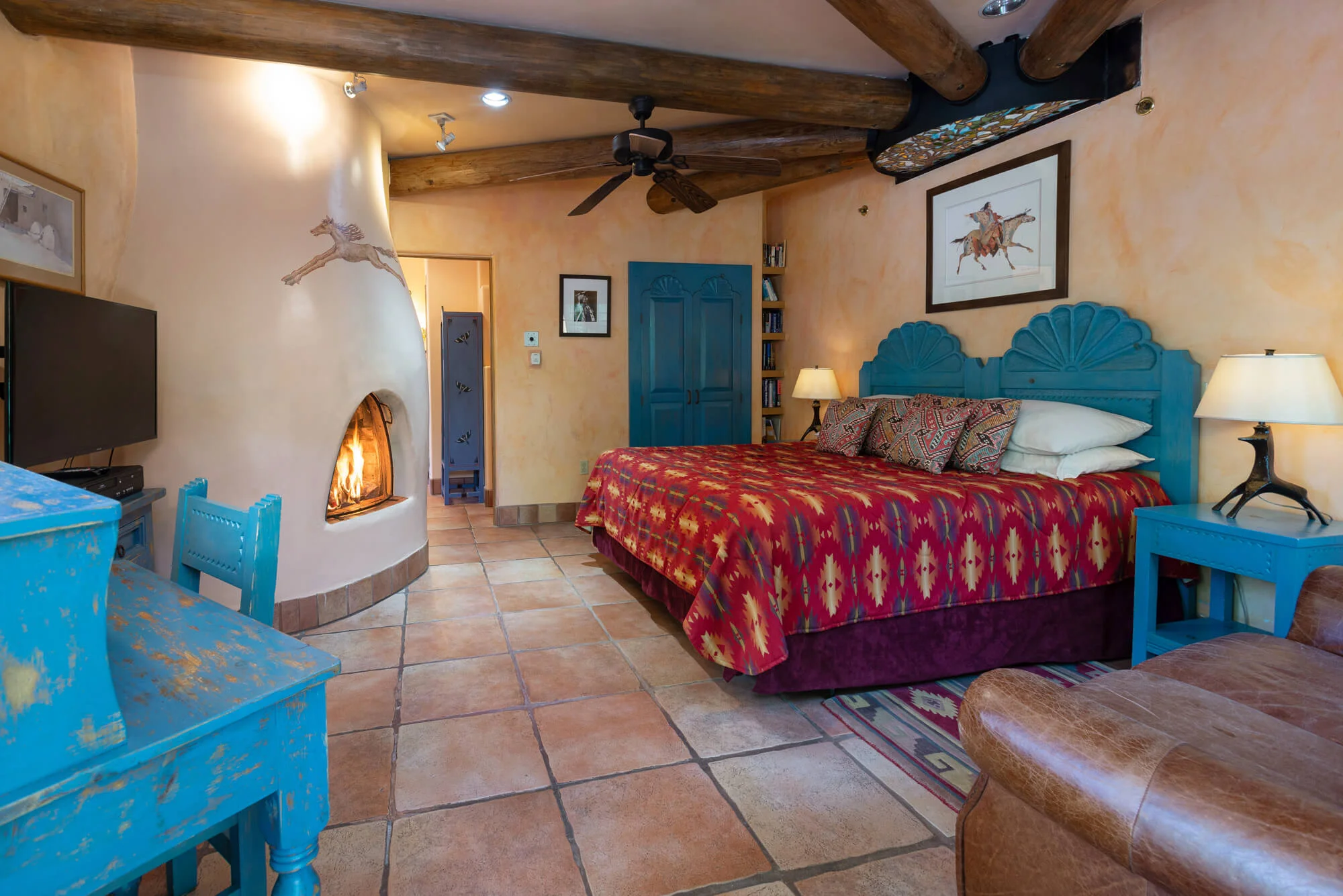 Taos Pubelo king room with kiva fireplace. Can also be set with two twin beds.